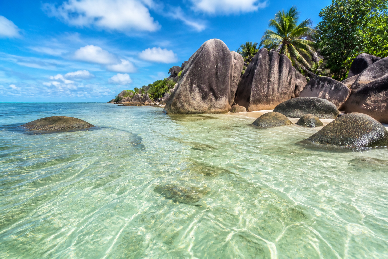 'Crystal clear water at Anse Source d'Argent La Digue during low tide'