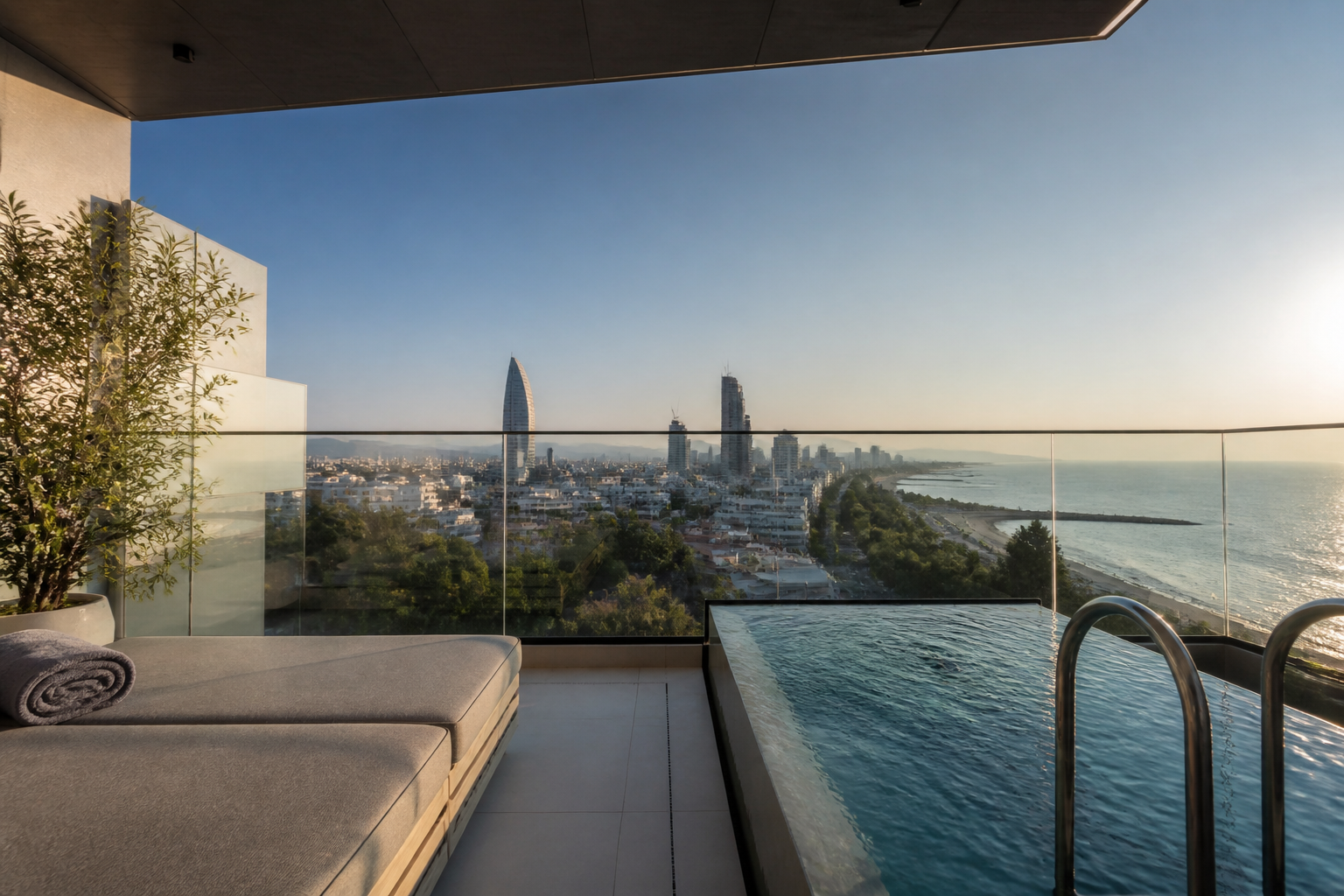 Modern hotel balcony with private plunge pool overlooking Limassol city skyline