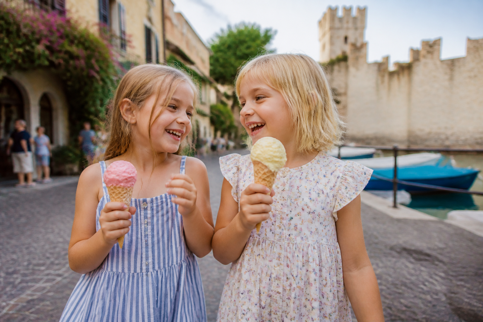 Happy children having ice cream in the streets of Sirmione Lake Garda